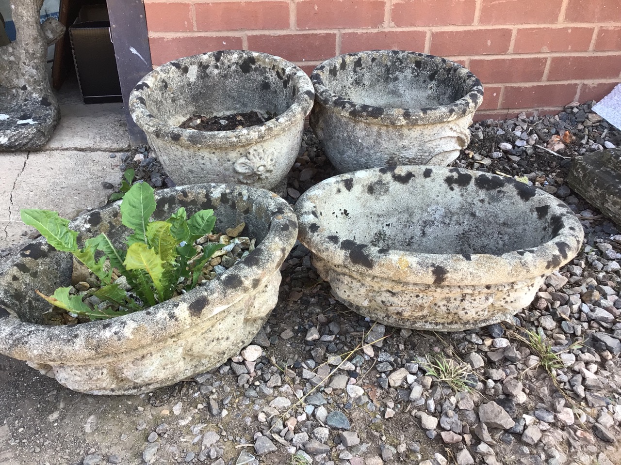 Four decorative concrete planters two circular and two oval. W:34cm x D:34cm x H:24cm - Image 2 of 2