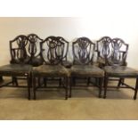 A set of eight Georgian style mahogany dining chairs.