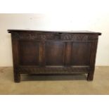 An English oak late 18th early 19th century carved coffer. W:122cm x D:52cm x H:72cm