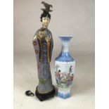 An egg shell hand painted porcelain vase, 25 cm high also with a Chinese cloisonnÃ© figurine