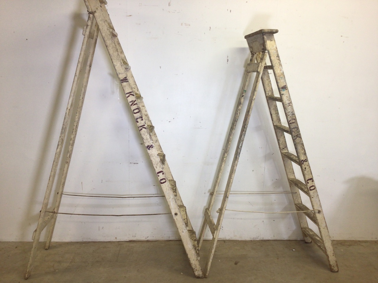 Two sets of vintage step ladders with original paintwork. H:205cm and H:183cm