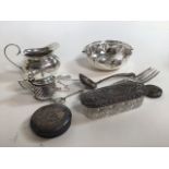 A silver salt with liner and silver lids. 2.485 oz. Also with silver plated items.