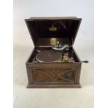 H.M.V oak cased wind up record player with needles in original tins. W:45cm x D:40cm x H:34cm