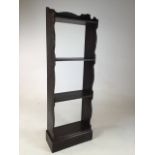 An early 20th century quarter sawn oak set of narrow bookshelves. W:34cm x D:16cm x H:9cm