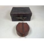 A Mappin & Webb leather vanity box with silver topped bottles and leather boxes together with a