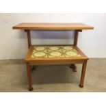 A pine table also with a tiled topped coffee table. W:107cm x D:52cm x H:74cm