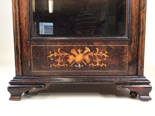 A Gillows style rosewood music cabinet with extensive inlay, glazed door to material lined - Image 5 of 12