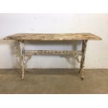 A Victorian Coalbrokdale style garden table with cast iron top. W:122cm x D:46cm x H:67cm