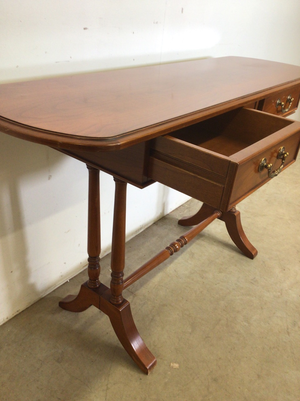 A 20th century French Cherry wood hall table with two drawers with brass handles, stretcher bar to - Image 5 of 5