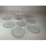 an Arcoroc glass punch set together with seven glass leaf design plates W:31cm x H:15cm