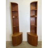 A pair of teak mid century G Plan two piece corner shelves with cupboards below. W:46cm x D:46cm x