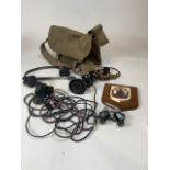 A canvas bag together with military headsets. DLR no 5 with plug, DLR no 2 and one other. A