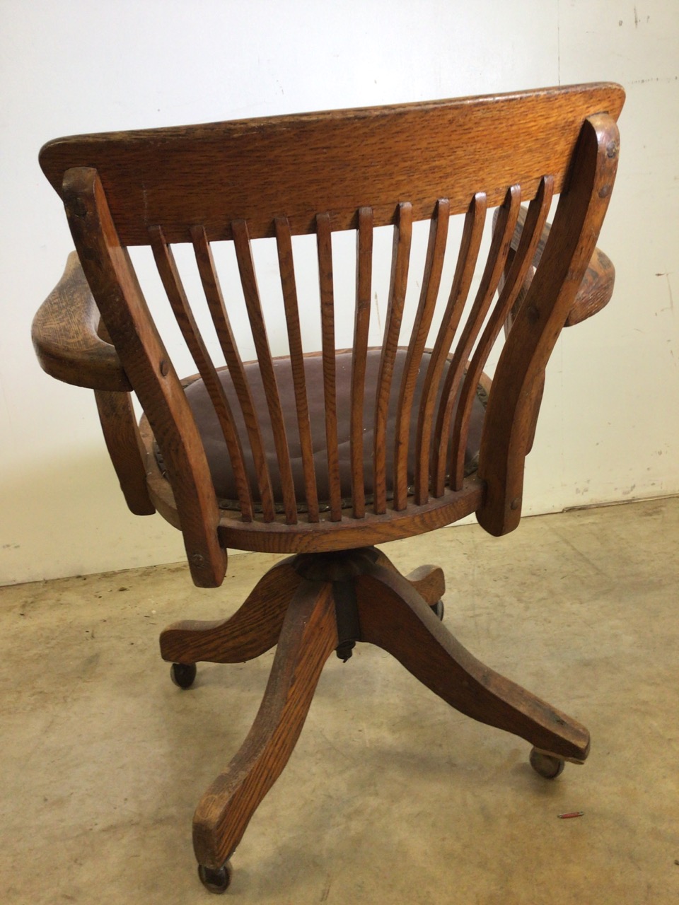 An early 20th century oak captains chair with tilt and swivel action, metal mechanics to base. - Image 5 of 11