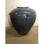A very large blue glazed ceramic pot. W:70cm x D:70cm x H:70cm