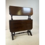 A mahogany Sherborne table with turned lags and pull out gate leg and ceramic and brass casters. W: