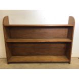 A set of hardwood shelves with curved sides. W:122cm x D:23cm x H:91cm