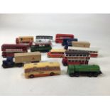 A collection of 00 gauge buses and lorries - fourteen in total. To include Taunton Cider, Tetleys,
