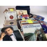 A collection of singles including the Beatles, Shirley Bassey, Ray Stevens, Tom Jones, Eddie Fisher,