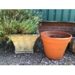 A large square planter also with a terracotta plant pot. W:48cm x D:48cm x H:36cm