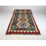 A Chobi Kilim Runner. W:62cm x H:193cm