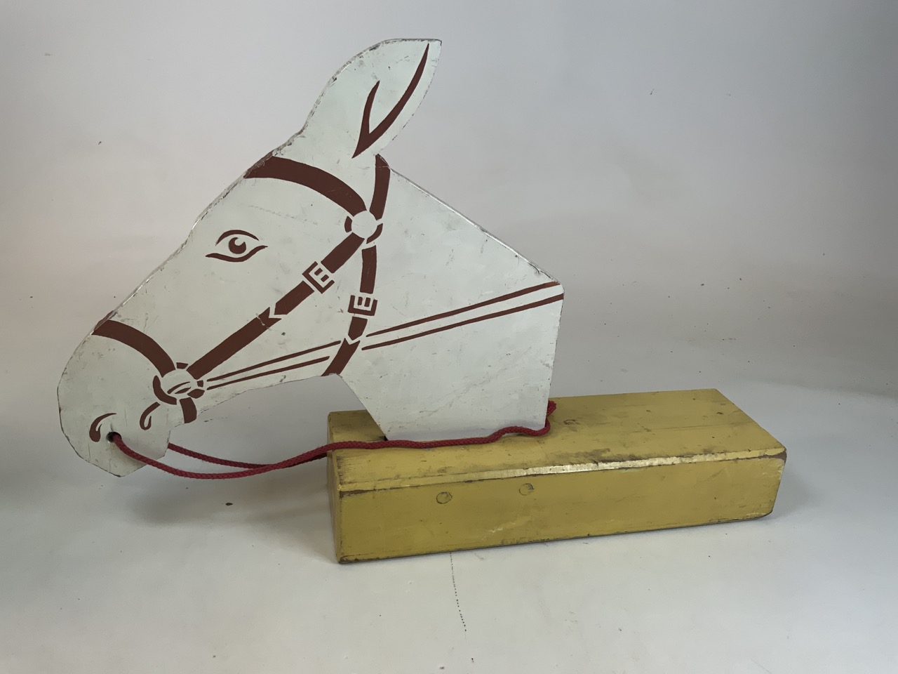 A wooden donkey head - for advertising donkey rides.
