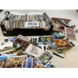 A large collection of modern postcards, used and unused.