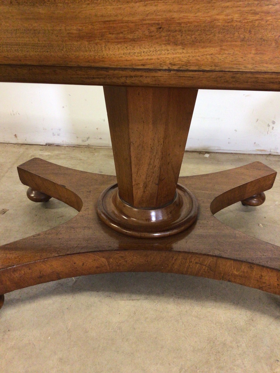 A Victorian Pembroke table with drop leaf sides, pedestal base with turned feet on metal castors. - Image 6 of 6