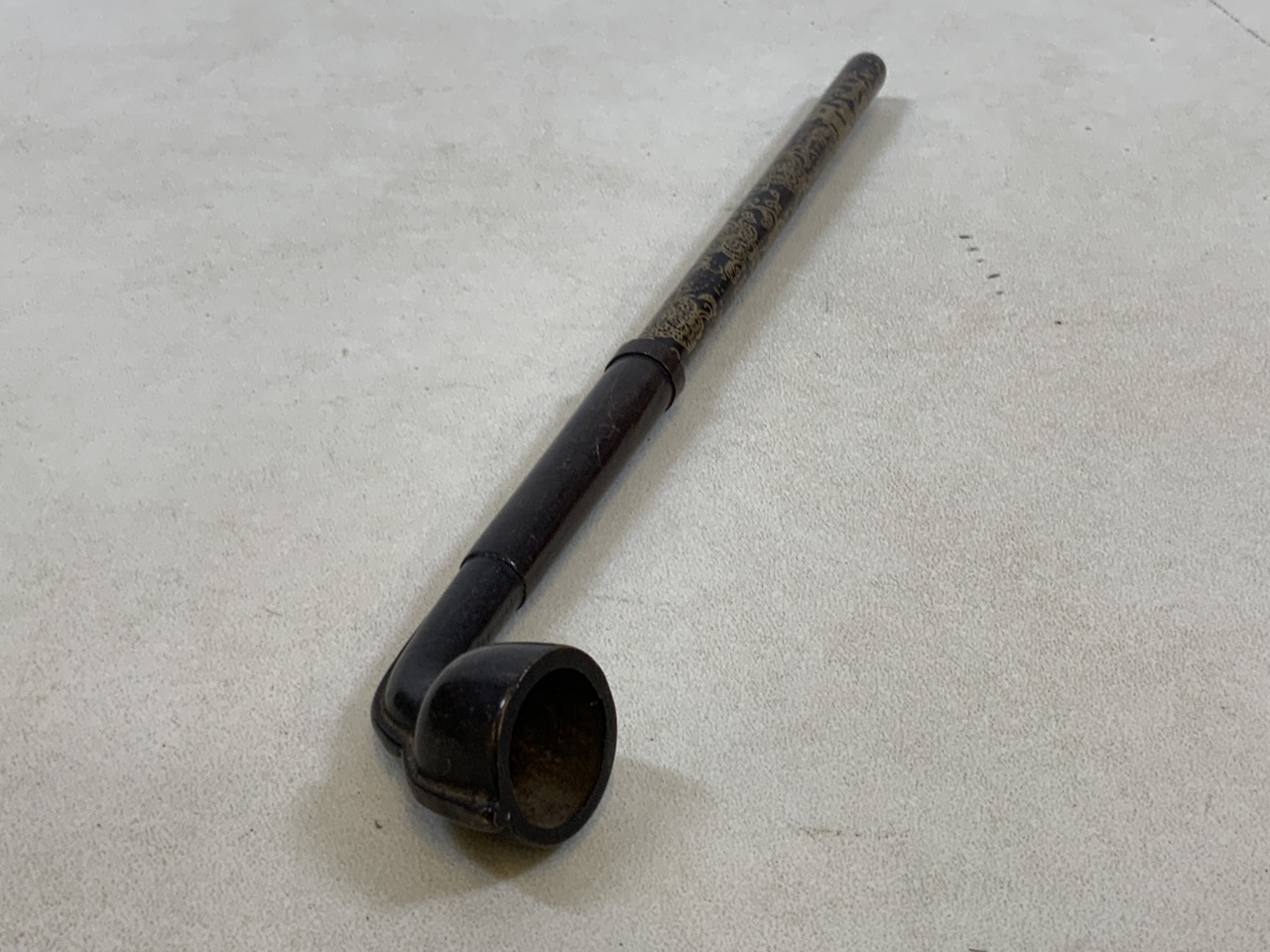 A decorated metal English Opium Pipe Circa 1910 H:37cm