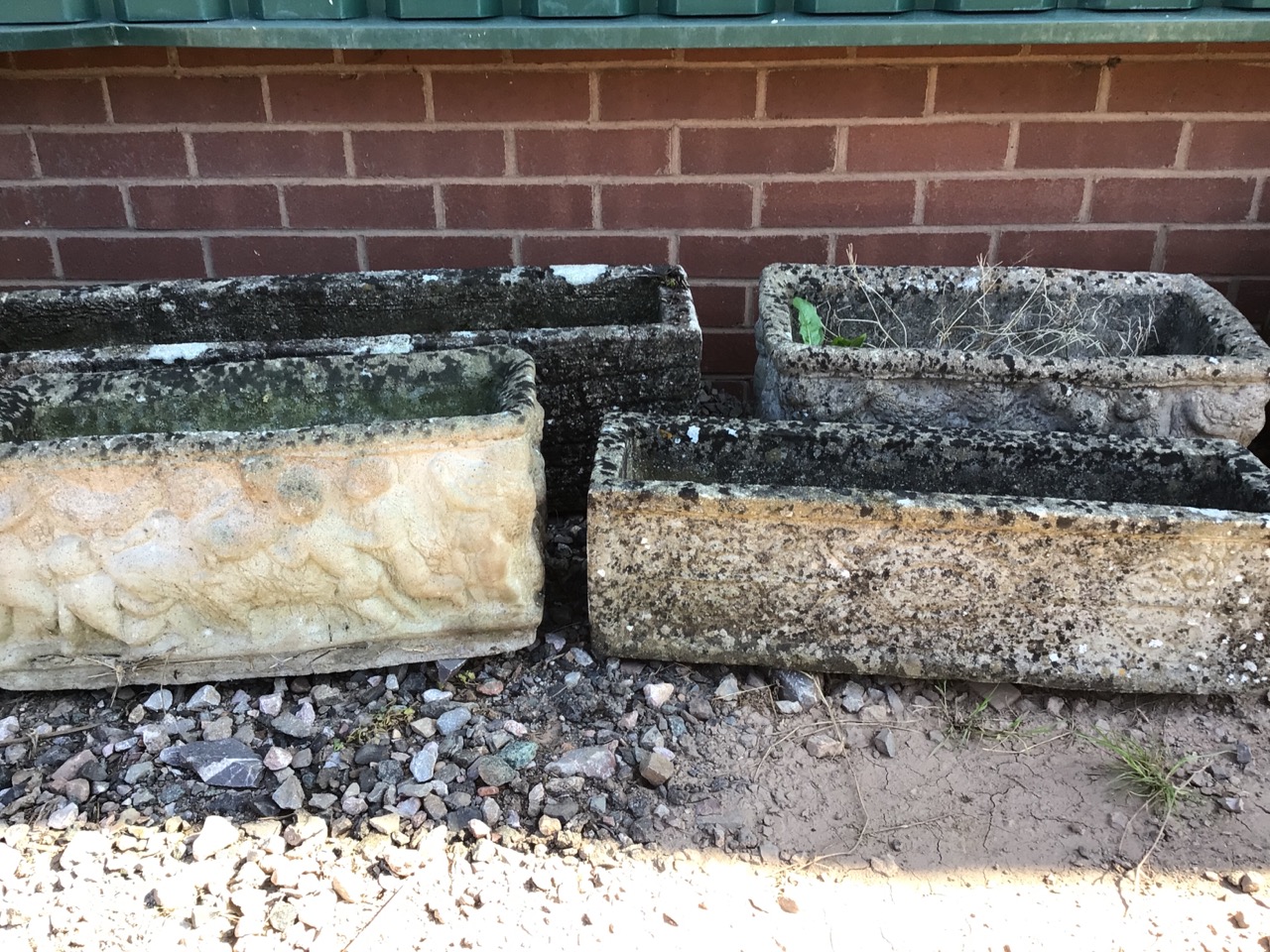 Four oblong concrete garden planters. W:91cm x D:22cm x H:25cm