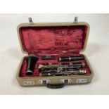 A vintage Corton Sapphire Clarinet in original case in used condition