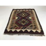 A Maimana Kilim rug. W:69cm x H:77cm