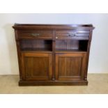 An early 20th c mahogany hall cupboard, two cupboard doors to base to interior shelves beneath