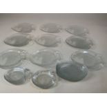 A collection of Arcoroc fish plates : eleven large, 26cm and eight small 17cm together with six leaf