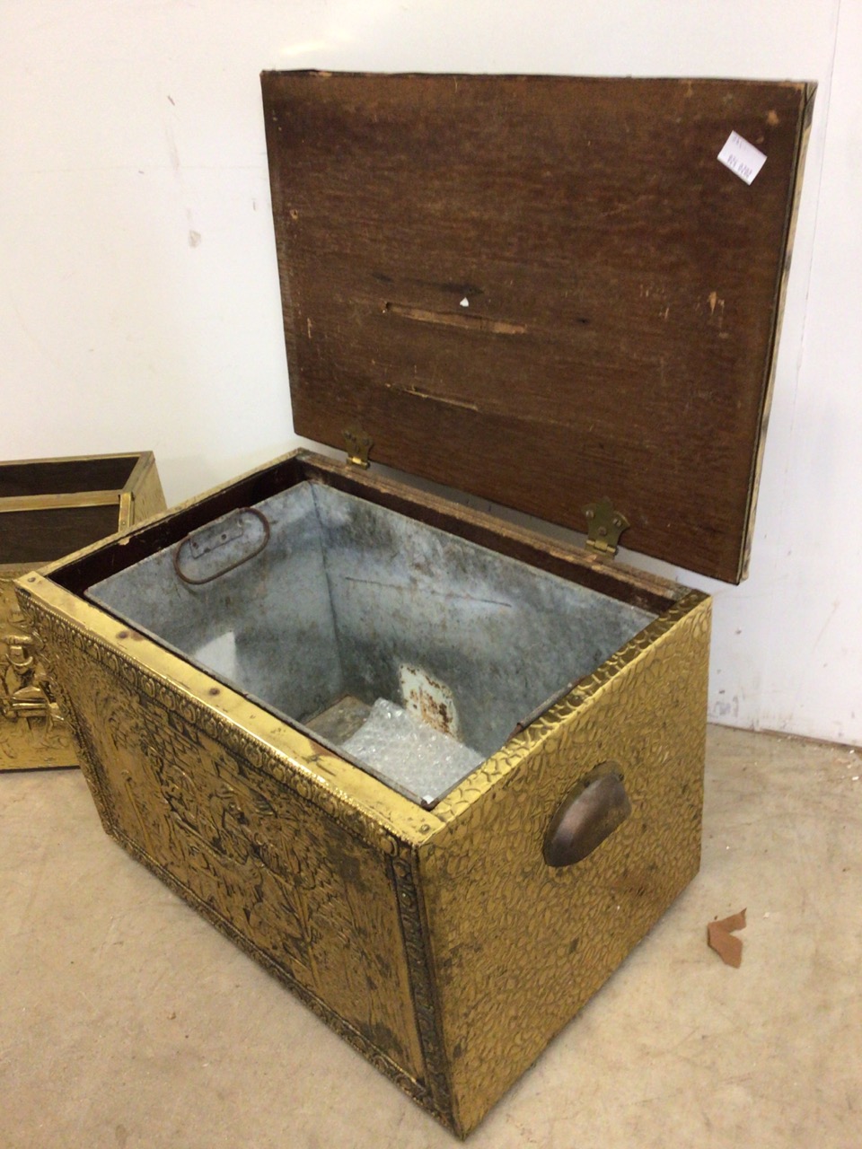 A brass coal box also with a magazine rack with images of pre lockdown action packed pub scenes. - Image 2 of 4