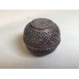 An Indian silver betel nut holder W:8.5cm x H:7.5cm slight dent to one side