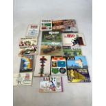 A collection of comic strip and illustrated book titles to include Walk Kellys Pogo Revisited, We