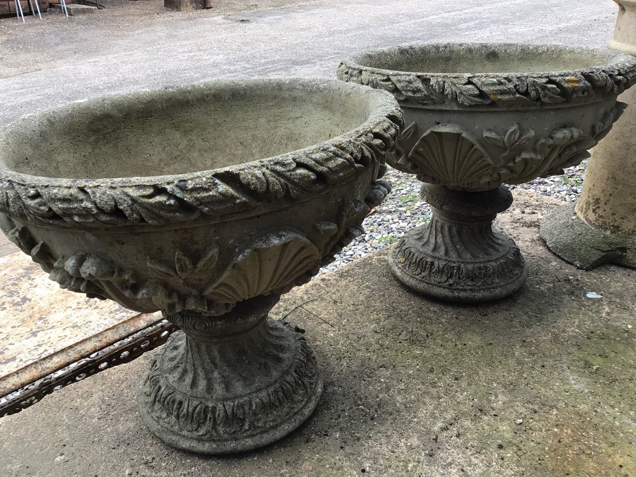 A pair of decorative circular reconstituted stone planters on separate plinths. W:53cm x D:53cm x - Image 5 of 5