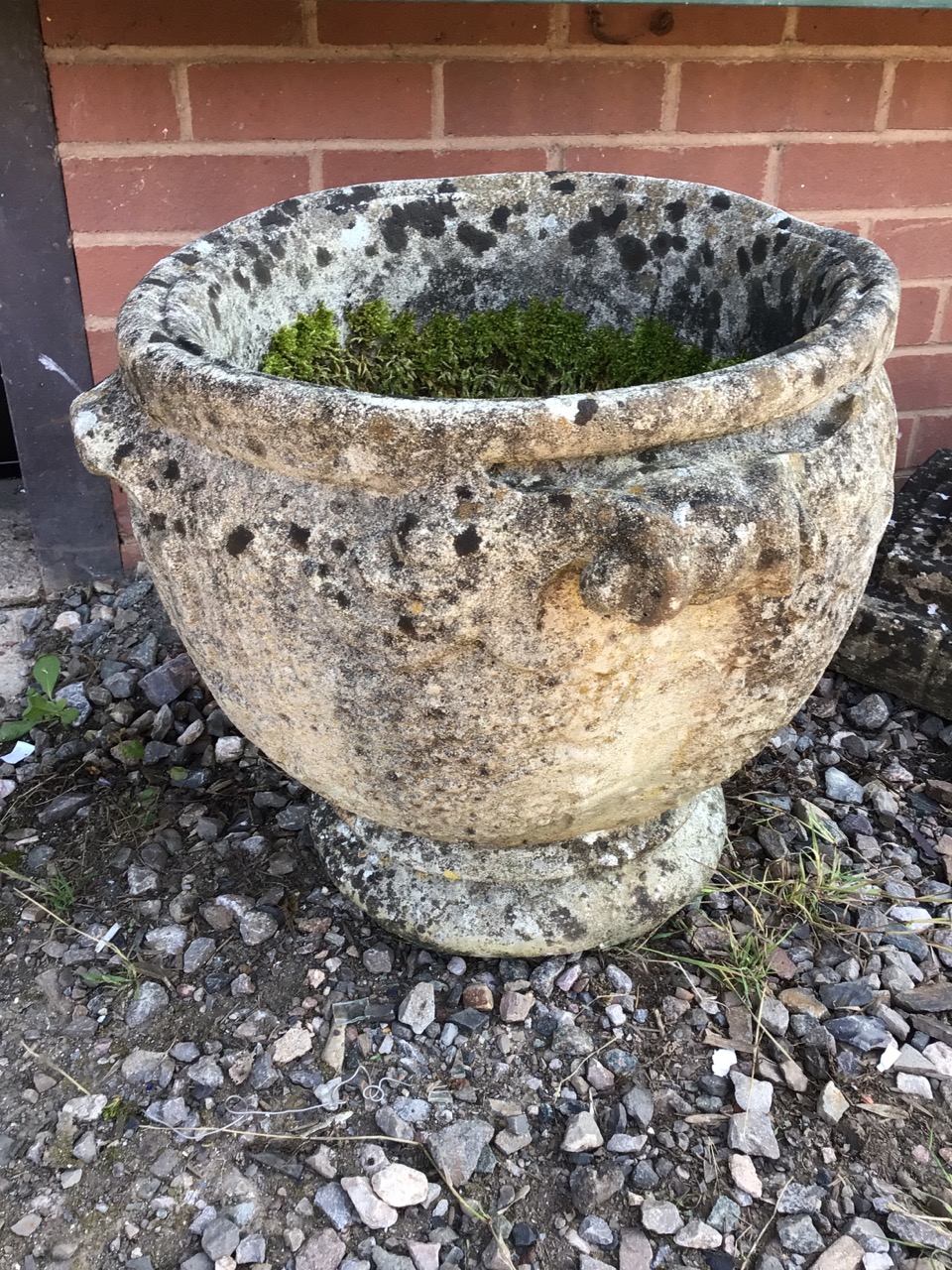 A large circular reconstituted stone planter. W:48cm x D:48cm x H:43cm