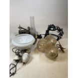 A quantity of vintage light fittings and shades including a pulley switch