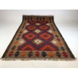 A Maimana Kilim rug. W:78cm x H:132cm