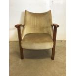 An early 20th century oak armchair with original upholstery and horsehair seat. Seat height H:36cm.