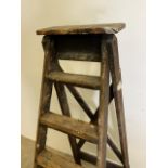 A set of vintage step ladders. W:48cm x H:153cm