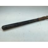 A Victorian Police truncheon, thought to be Metropolitan. Turned wood painted in black with gilt/