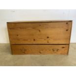 A pine blanket box with drawer below and metal handles. W:95cm x D:50cm x H:54cm