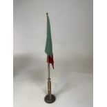 A brass Portuguese desk flag with weighted base and working pulley together with a miniature desk
