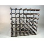 A vintage Farrow & Jackson vintage wine rack for thirty six bottles. Manufacturers label to front
