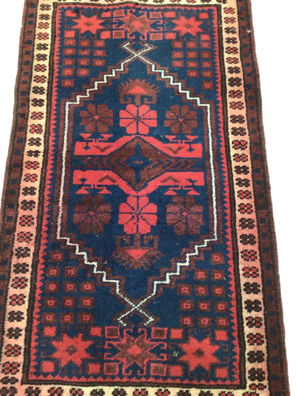 A Turkish prayer rug, maroon and navy. W:103cm x D:57cm x - Image 3 of 4