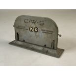 A C.W.S white metal desk callendar W:19.5cm x D:5.5cm x H:11cm