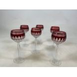 A set of six red Waterford crystal Wine / Hock glasses. Signed to base W:7cm x H:20cm