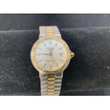 A Longines Conquest VHP stainless steel and gold ladies bracelet watch. Untested